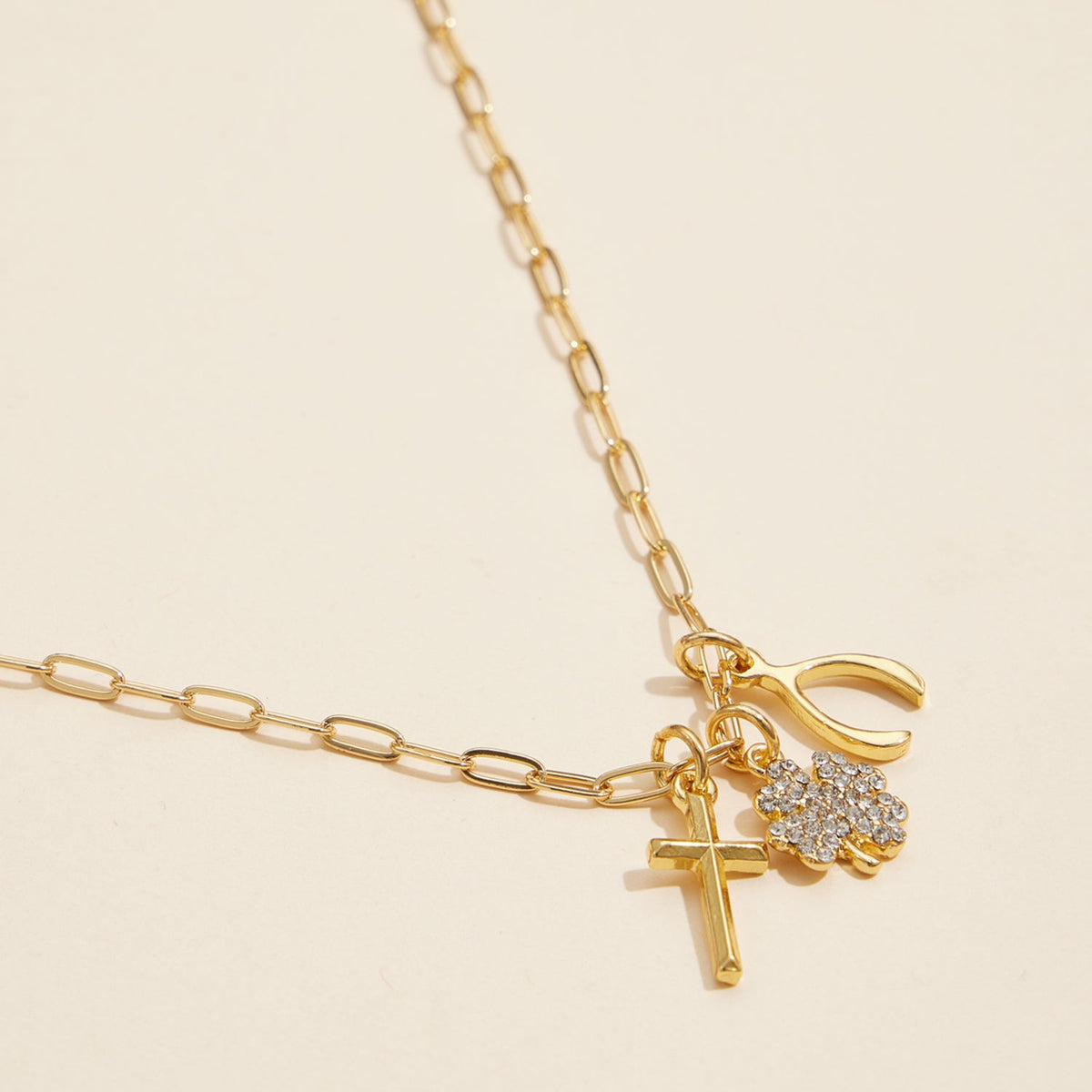 Gold Dipped Charm Necklace with Cross, Clover, and Wishbone