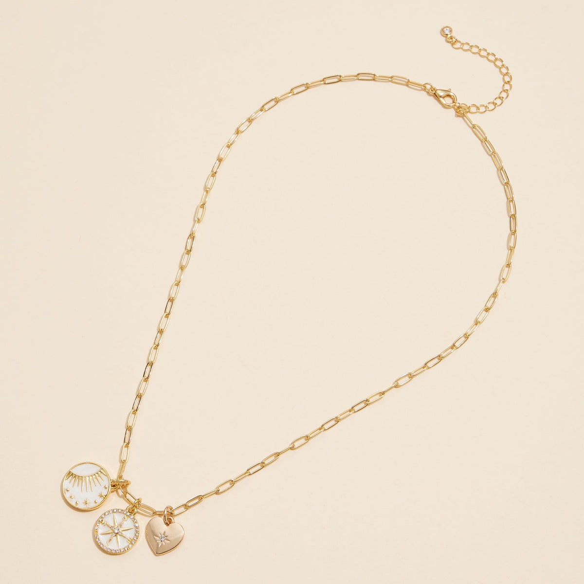 Gold Dipped Celestial Charm Necklace with Heart, Sun, and Compass