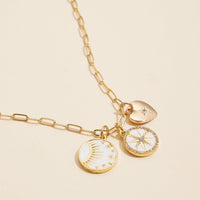 Gold Dipped Celestial Charm Necklace with Heart, Sun, and Compass