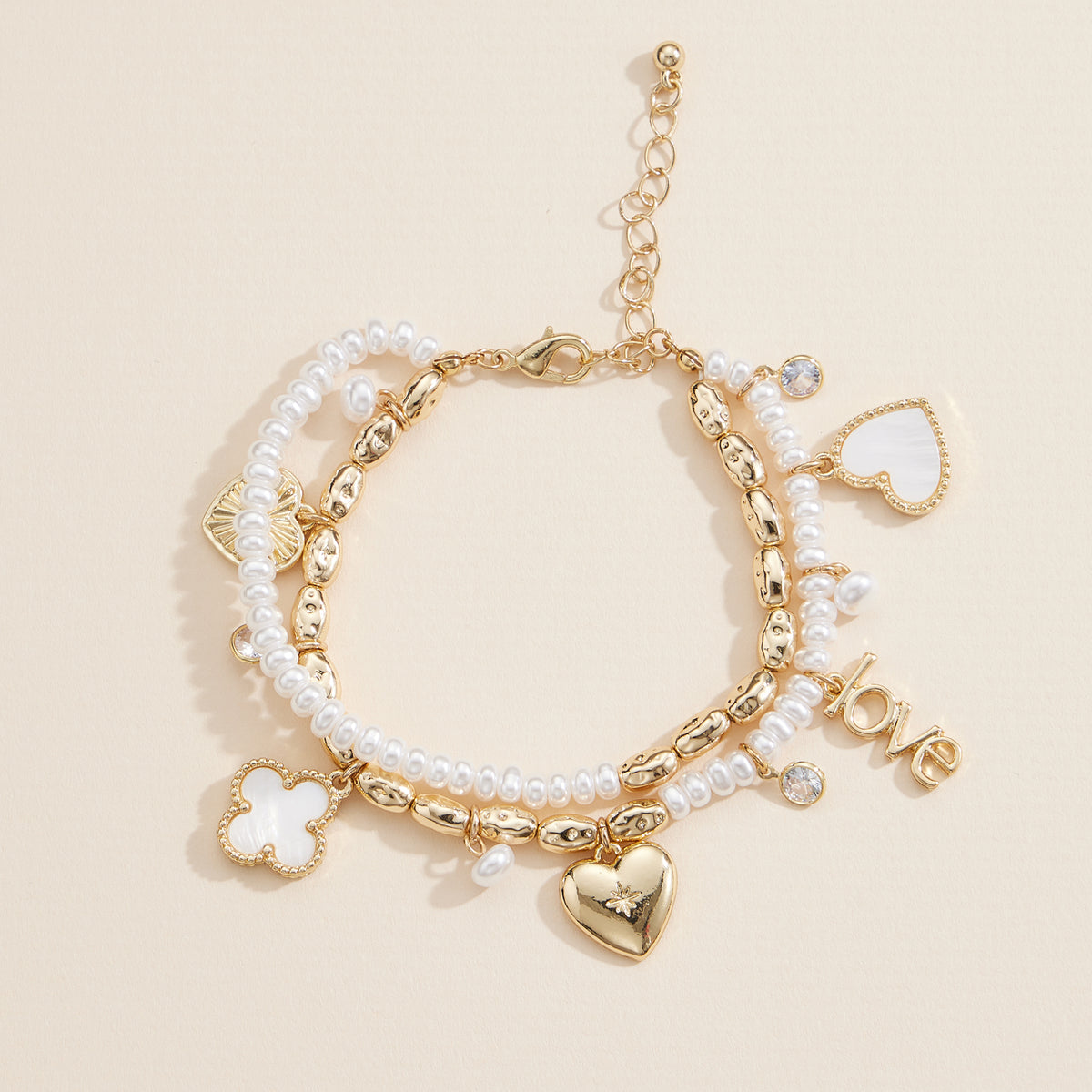 Layered Pearl Charm Bracelet – Love, Heart, and Clover Pendants