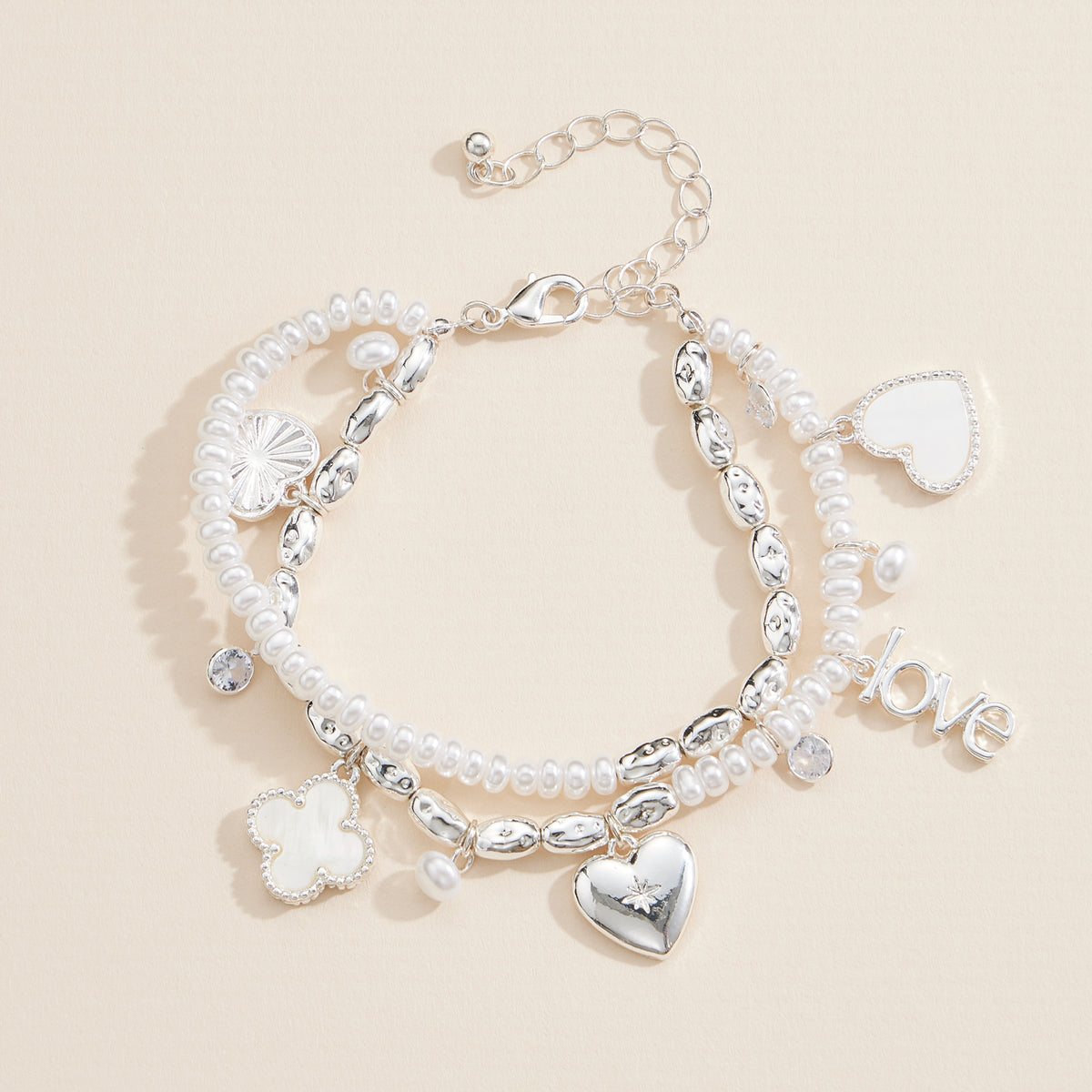 Layered Pearl Charm Bracelet – Love, Heart, and Clover Pendants