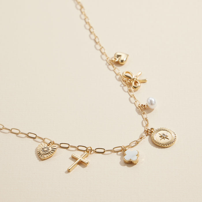 Charm Necklace with Heart, Cross, Compass Pearl, and Bow Pendants