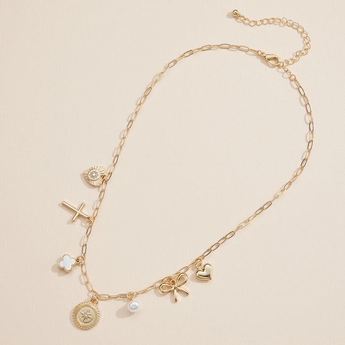 Charm Necklace with Heart, Cross, Compass Pearl, and Bow Pendants