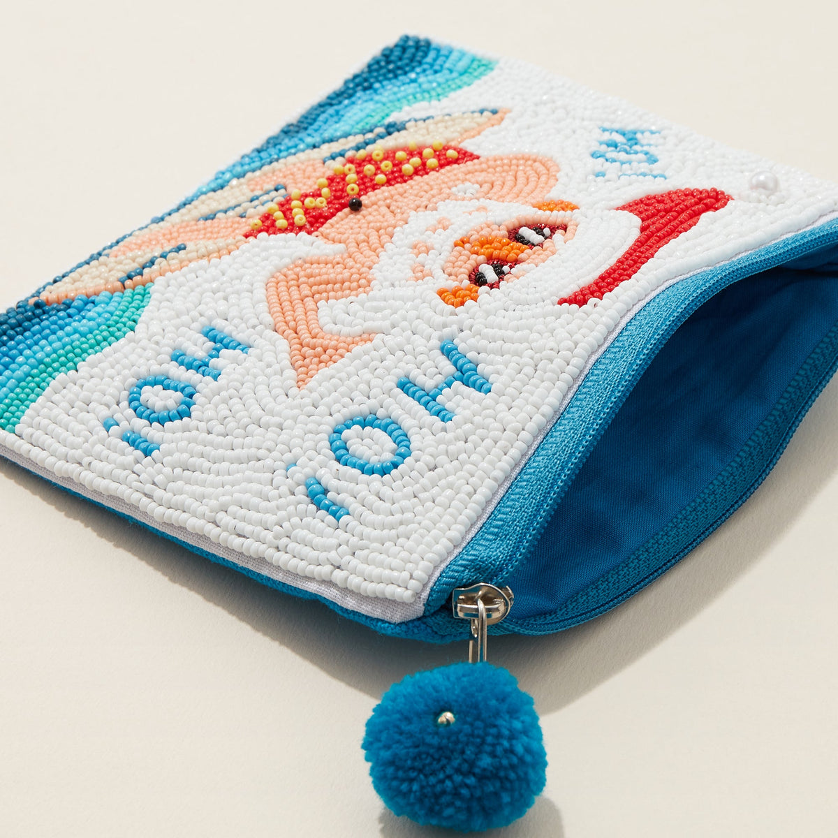 Surfing Santa Seed Bead Canvas Pouch with a Pom