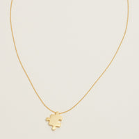 Gold Dipped Jigsaw Puzzle Pendant Necklace