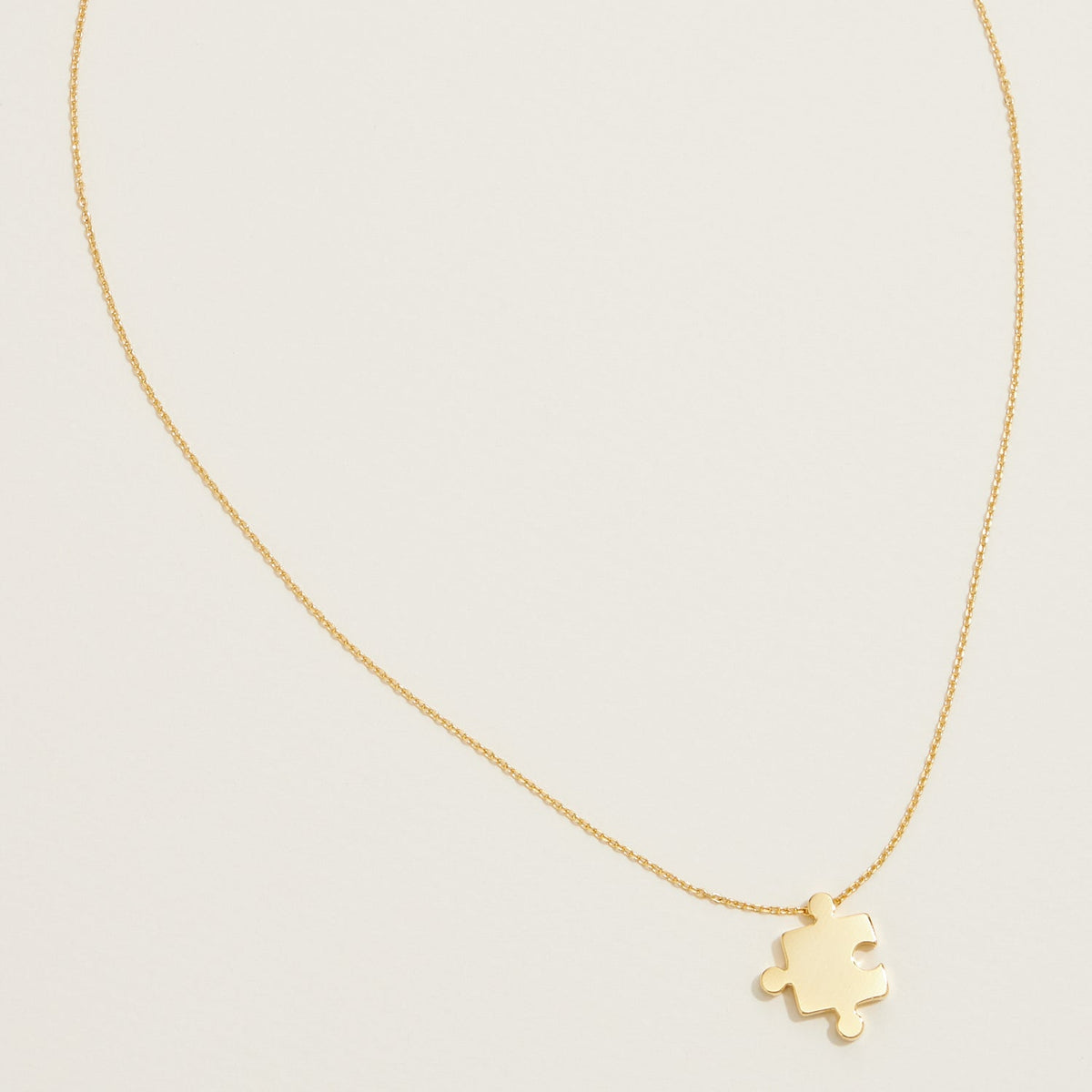 Gold Dipped Jigsaw Puzzle Pendant Necklace