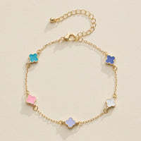 Gold Clover Charm Bracelet – Elegant Dainty Chain with Enamel Accents