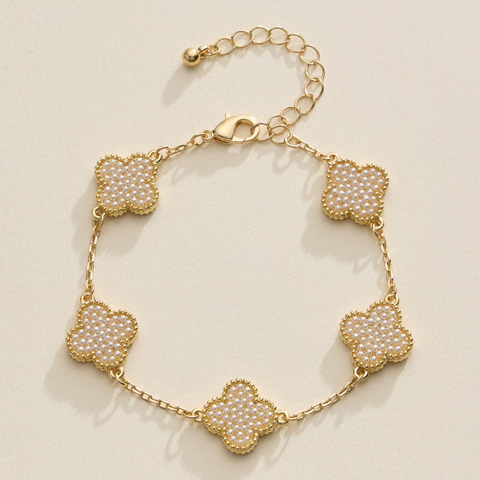 Gold Clover Bracelet with Pearl Beaded Accents – Elegant Four-Leaf Design