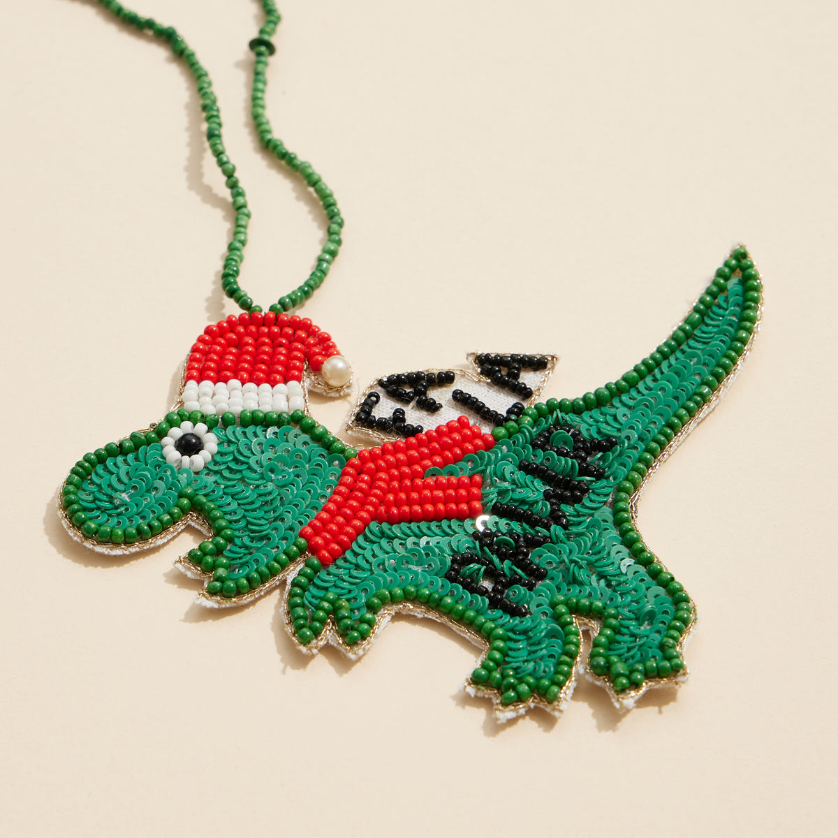 Festive Dinosaur Ornament with Beaded Details